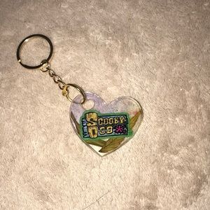 Custom epoxy keychain heart with Scooby Doo and my favorite leaves New